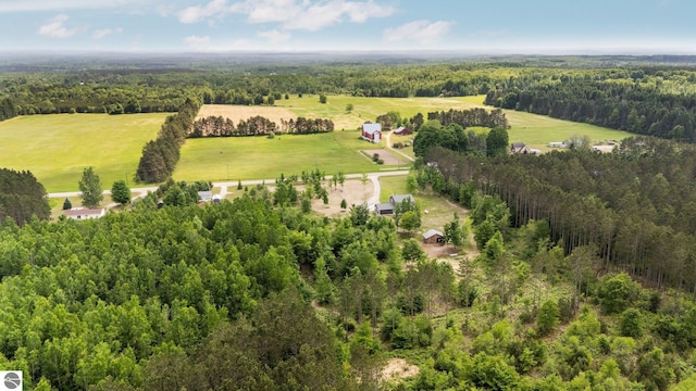 6330 Lund Rd SW, Fife Lake, MI 49633 - view of rural area featuring a heavily wooded area