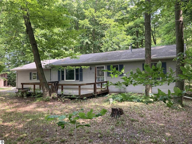 653 S Morrison Rd, West Branch, MI 48661 - ranch-style home featuring a deck