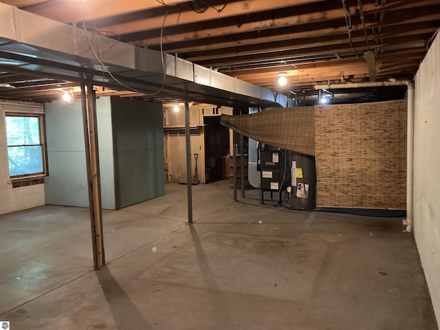 653 S Morrison Rd, West Branch, MI 48661 - basement with water heater and heating unit