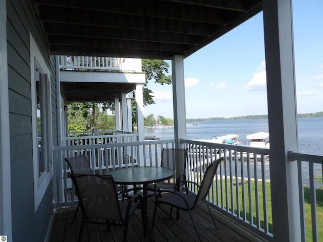 1246 Sunnyside Dr Unit 203, 4 & 8, Cadillac, MI 49601 - wooden terrace featuring a water view
