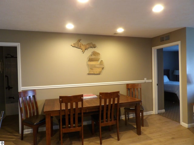 1246 Sunnyside Dr Unit 203, 4 & 8, Cadillac, MI 49601 - dining space with wood finished floors and recessed lighting