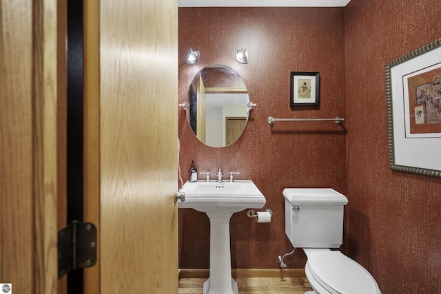 3810 Ridgeway Pl, Traverse City, MI 49684 - bathroom with toilet and wood finished floors