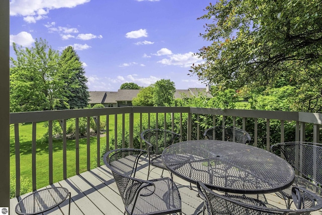 3810 Ridgeway Pl, Traverse City, MI 49684 - wooden terrace featuring a yard