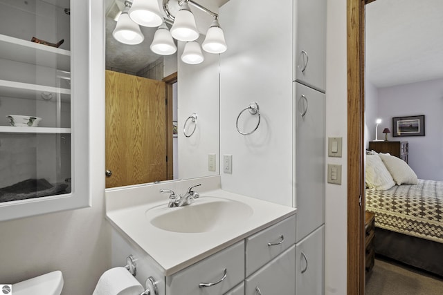 3810 Ridgeway Pl, Traverse City, MI 49684 - ensuite bathroom with vanity and toilet