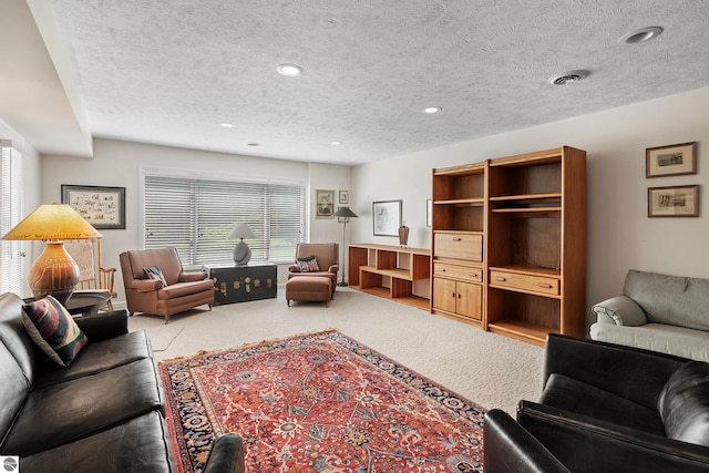 3810 Ridgeway Pl, Traverse City, MI 49684 - living area with carpet flooring, a textured ceiling, and recessed lighting