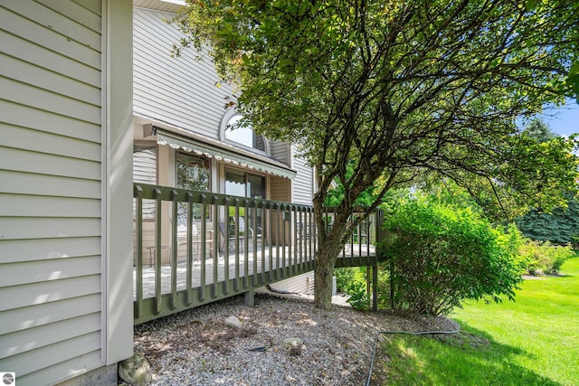 3810 Ridgeway Pl, Traverse City, MI 49684 - wooden terrace with a lawn