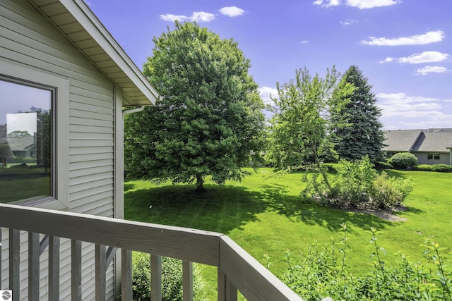 3810 Ridgeway Pl, Traverse City, MI 49684 - view of green lawn with a balcony