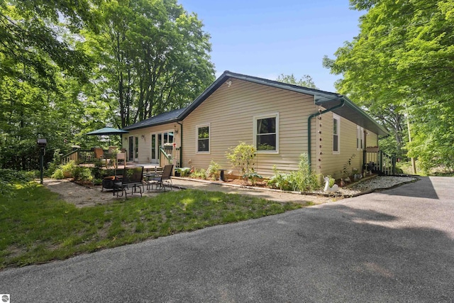 3048 Frankfort Hwy, Frankfort, MI 49635 - view of front of property with a patio