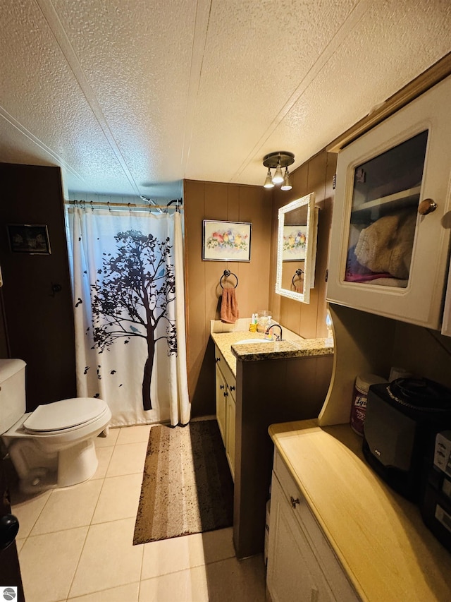 126 Chippewa Trl, Buckley, MI 49620 - full bath with a textured ceiling, vanity, a shower with shower curtain, and tile patterned floors