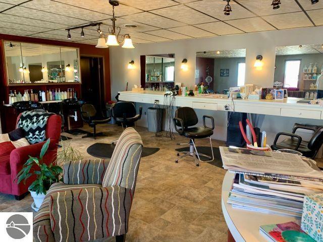 180 S Benzie Blvd, Beulah, MI 49617 - living room featuring track lighting