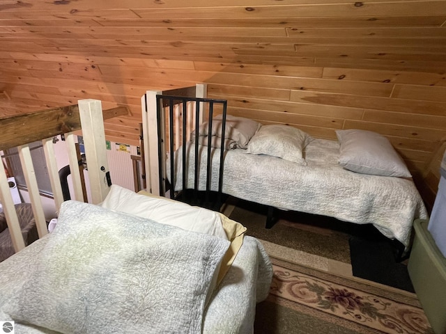 5218 E Laird Lake Rd, Hale, MI 48739 - bedroom featuring wood ceiling and wooden walls