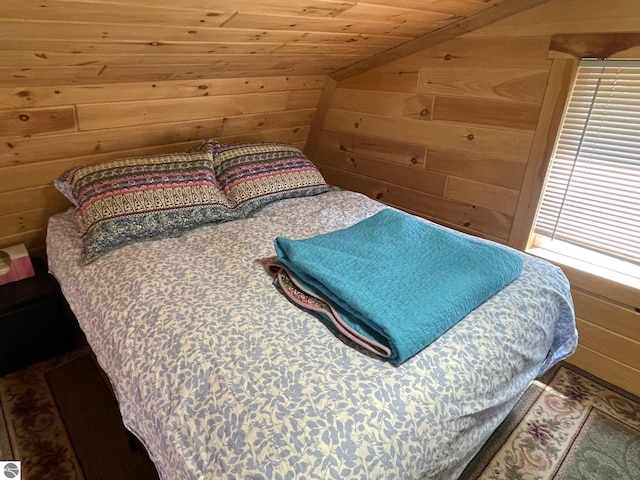 5218 E Laird Lake Rd, Hale, MI 48739 - bedroom featuring wood walls, wooden ceiling, and lofted ceiling