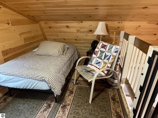 5218 E Laird Lake Rd, Hale, MI 48739 - bedroom with wood walls, wood ceiling, and lofted ceiling