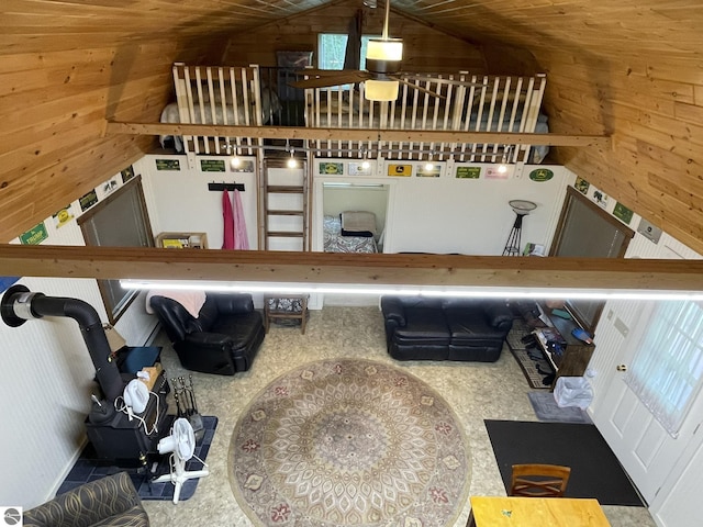 5218 E Laird Lake Rd, Hale, MI 48739 - living area with wooden walls and vaulted ceiling