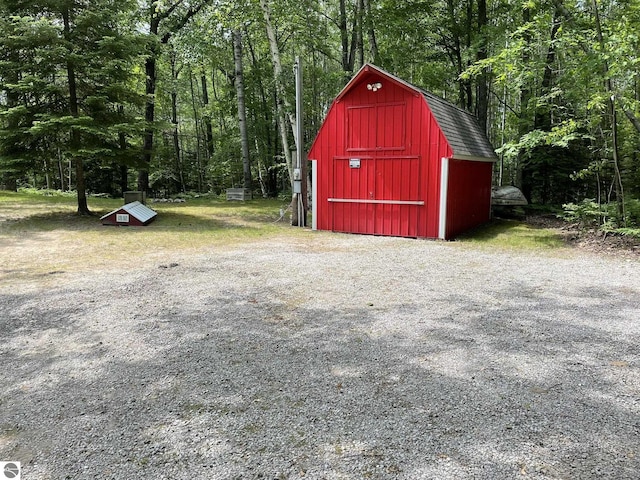 5218 E Laird Lake Rd, Hale, MI 48739 - view of shed with a forest view