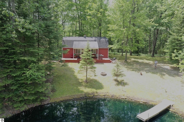 5218 E Laird Lake Rd, Hale, MI 48739 - view of green lawn with a deck and a view of trees
