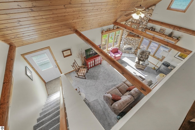 6387 W Maple St, Lake City, MI 49651 - living area featuring wooden ceiling, ceiling fan, carpet, and high vaulted ceiling