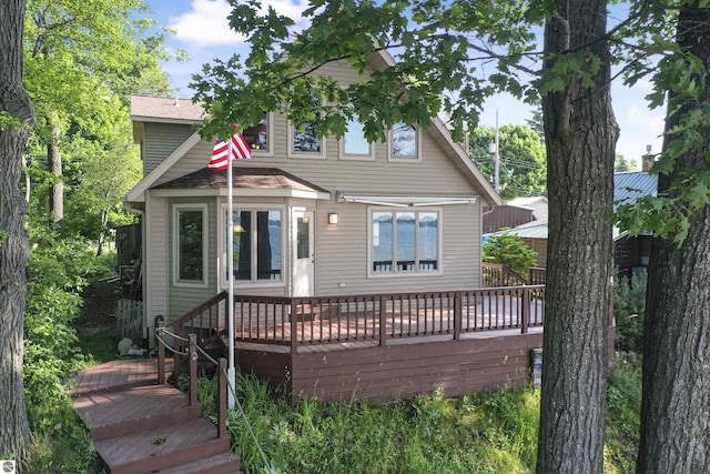 6387 W Maple St, Lake City, MI 49651 - view of front of house with a deck