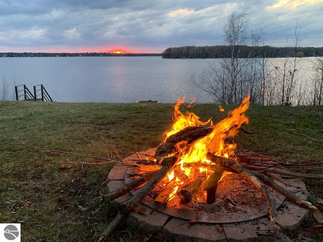 7600 Maple St, Grawn, MI 49637 - water view with a fire pit