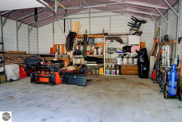 7600 Maple St, Grawn, MI 49637 - garage with metal wall