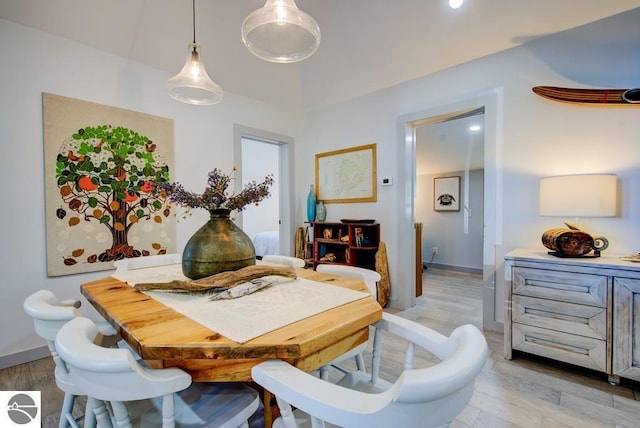 7600 Maple St, Grawn, MI 49637 - dining space with light wood-type flooring and recessed lighting