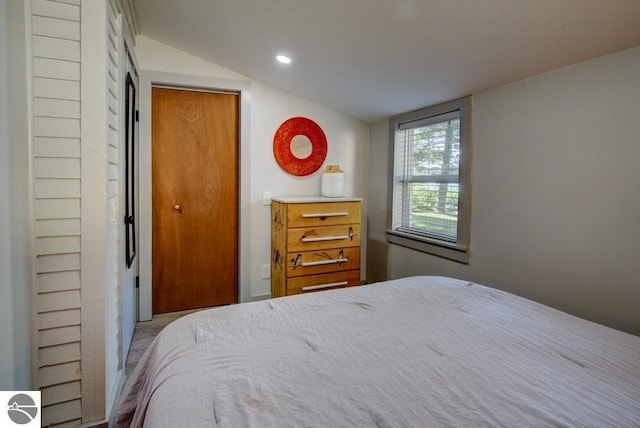 7600 Maple St, Grawn, MI 49637 - bedroom with recessed lighting and vaulted ceiling