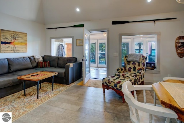 7600 Maple St, Grawn, MI 49637 - living area with french doors, recessed lighting, and vaulted ceiling