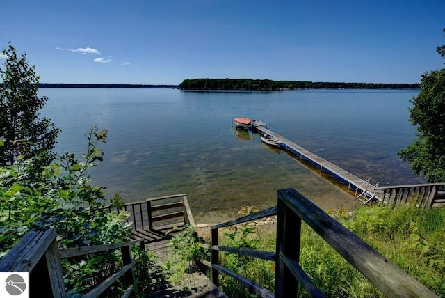 7600 Maple St, Grawn, MI 49637 - dock with a water view