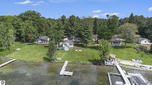 8781 Clam Lake Rd, Bellaire, MI 49615 - view of subject property featuring a large body of water