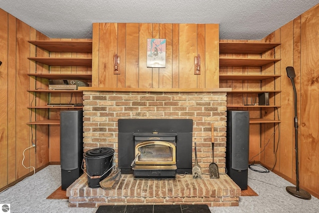 10085 Harmony Dr, Interlochen, MI 49643 - detailed view of carpet flooring, a textured ceiling, a wood stove, and wood walls