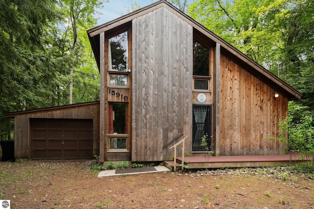 15910 E Cherry Park Dr, Northport, MI 49670 - view of outdoor structure with a garage