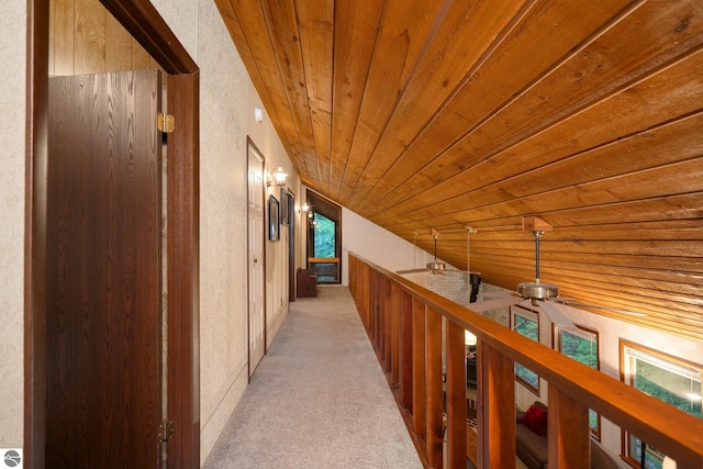 15910 E Cherry Park Dr, Northport, MI 49670 - hall with wood ceiling, light colored carpet, and an upstairs landing