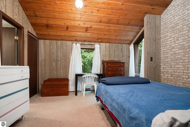 15910 E Cherry Park Dr, Northport, MI 49670 - carpeted bedroom with wood ceiling, multiple windows, lofted ceiling, and brick wall