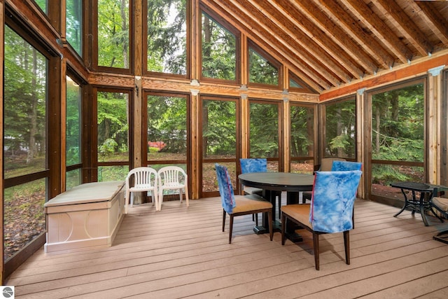 15910 E Cherry Park Dr, Northport, MI 49670 - sunroom featuring outdoor dining area and vaulted ceiling