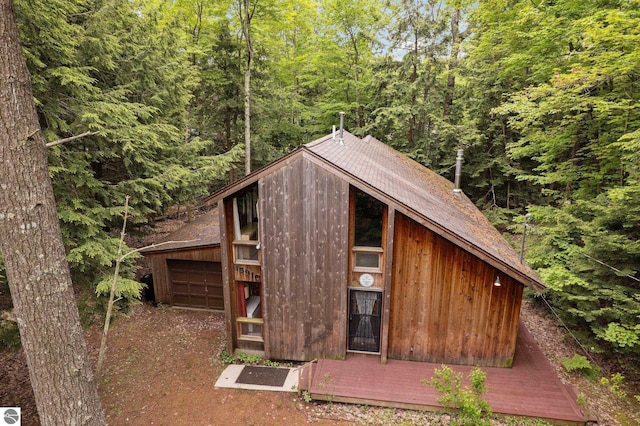15910 E Cherry Park Dr, Northport, MI 49670 - view of outdoor structure with a forest view