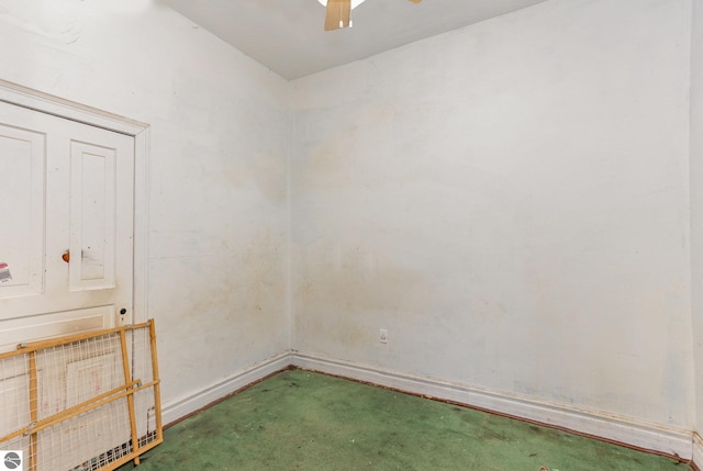309 W Orchard Ave, Shepherd, MI 48883 - unfurnished room featuring carpet floors and a ceiling fan