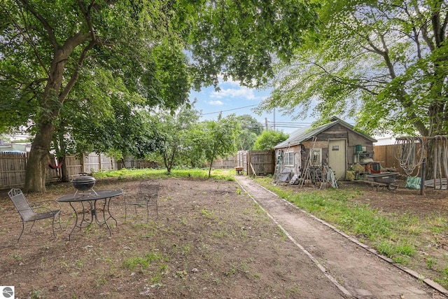 309 W Orchard Ave, Shepherd, MI 48883 - fenced backyard with a shed