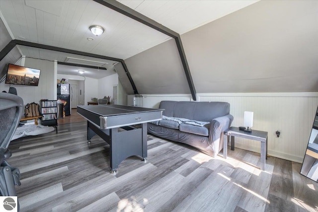 100 S Bullock St, Whittemore, MI 48770 - recreation room with wood finished floors, lofted ceiling, and wood walls