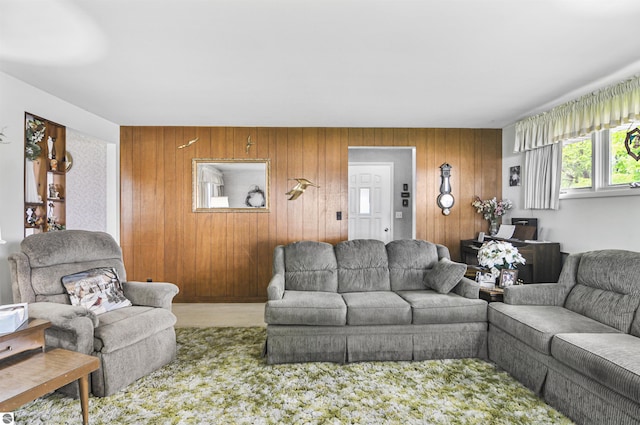 611 Sunset Ln, Cadillac, MI 49601 - living room featuring wood walls