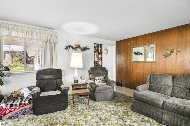 611 Sunset Ln, Cadillac, MI 49601 - living area featuring wood walls