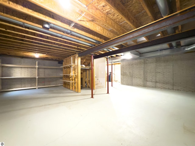 318 Red Maple Ln, Shepherd, MI 48883 - unfinished below grade area with stairway