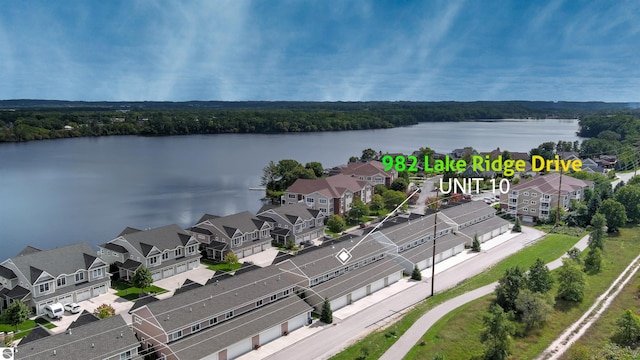 982 Lake Ridge Dr Unit 10, Traverse City, MI 49684 - aerial perspective of suburban area with a nearby body of water