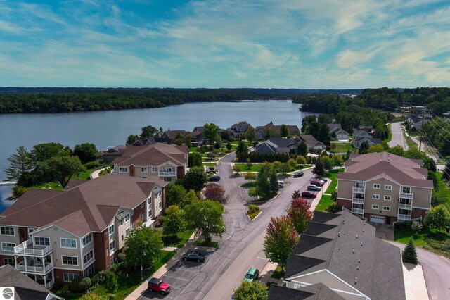 982 Lake Ridge Dr Unit 10, Traverse City, MI 49684 - aerial view of residential area with a nearby body of water