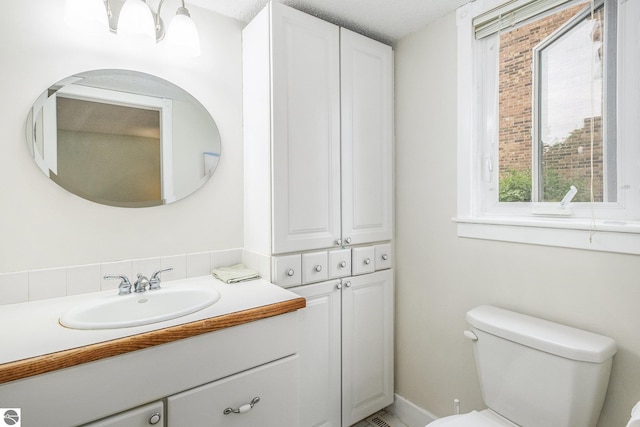 6022 Holt Rd Unit 2, Williamsburg, MI 49690 - bathroom featuring toilet and vanity