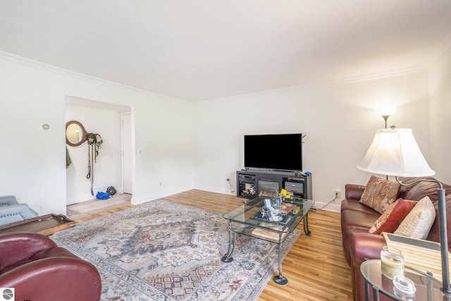 6022 Holt Rd Unit 2, Williamsburg, MI 49690 - living area featuring ornamental molding and wood finished floors