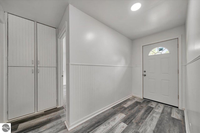 3594 Channel Rd, Hale, MI 48739 - foyer entrance featuring wood finished floors and wainscoting