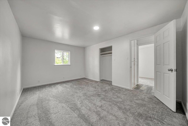 3594 Channel Rd, Hale, MI 48739 - unfurnished bedroom featuring carpet, recessed lighting, and a closet