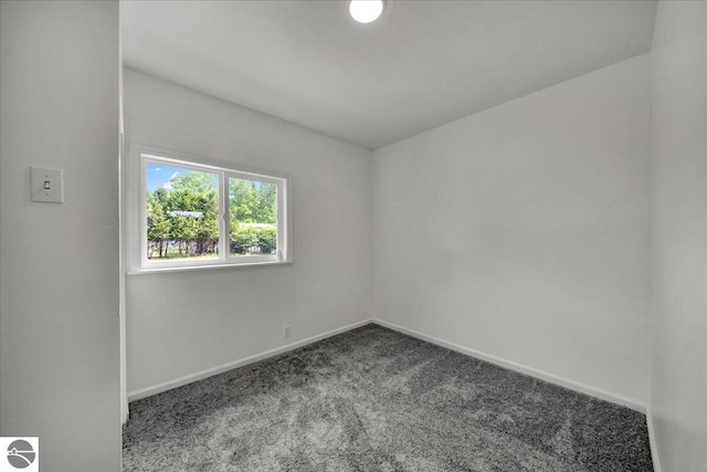3594 Channel Rd, Hale, MI 48739 - carpeted spare room with baseboards