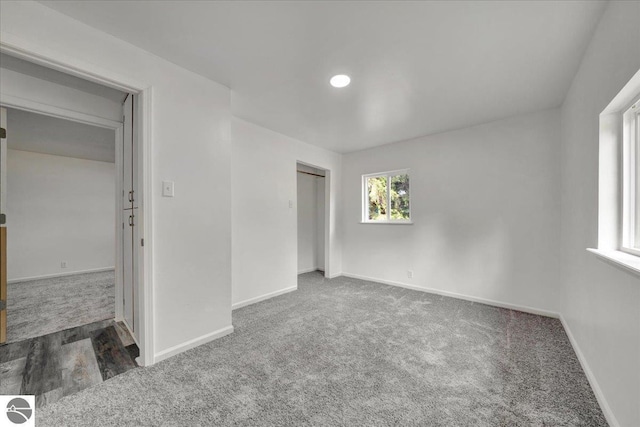 3594 Channel Rd, Hale, MI 48739 - unfurnished bedroom with carpet, a closet, and recessed lighting