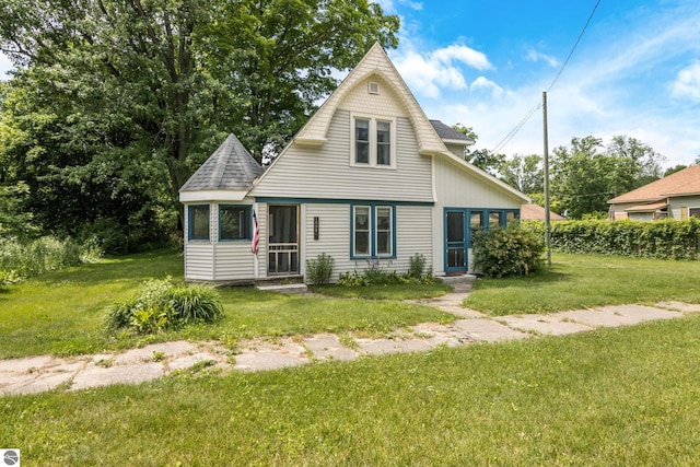 7692 3rd St, Thompsonville, MI 49683 - view of front of property with a front yard